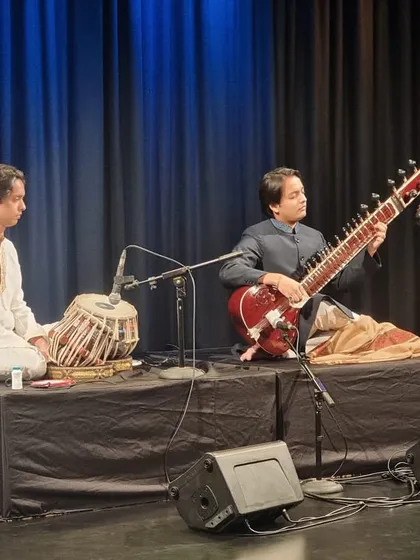 On stage with my brother Khurram at SIFAS. This 'Strings of Legacy' concert was a tribute to our father's journey and the music he passed down to us.