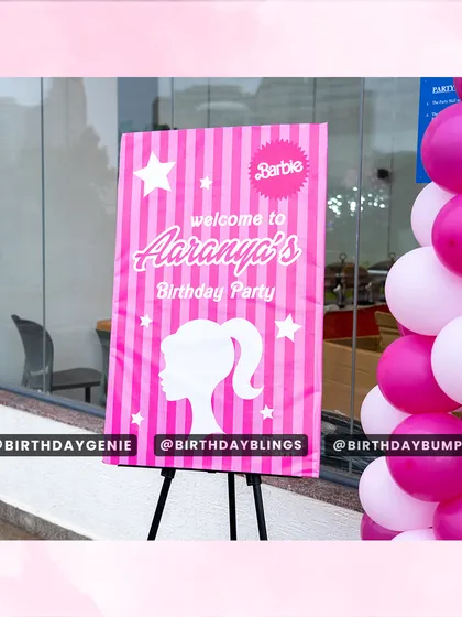 A personalized "Welcome to the Party" sign is a great way to greet guests. This one was designed to perfectly match the pink and white Barbie theme.