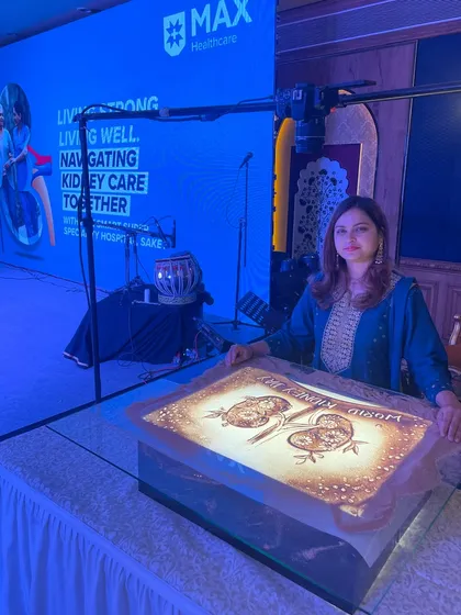 Posing with my artwork after the Max Healthcare event. The piece was designed to raise awareness for kidney care in an artistic and memorable way.