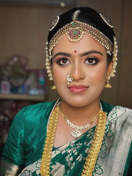 A portrait showing the complete traditional headwear and how the makeup complements it.