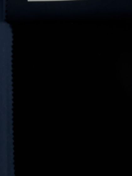 The black Japanese fabric chosen for the straight-fit trousers provides a beautiful drape and a deep, rich color that perfectly contrasts the white blazer.