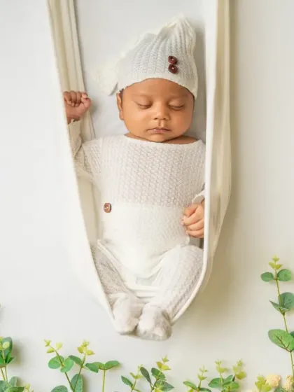 Peaceful, safe, and dreaming. As certified newborn photographers, your baby's comfort is our top priority, allowing us to capture these serene moments while they rest.