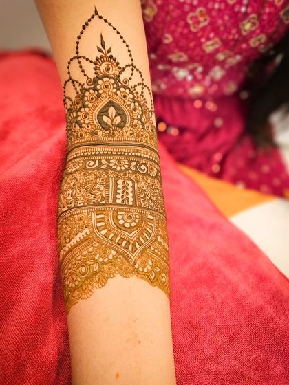 A close-up of the armband, featuring a unique jewelry-like design.