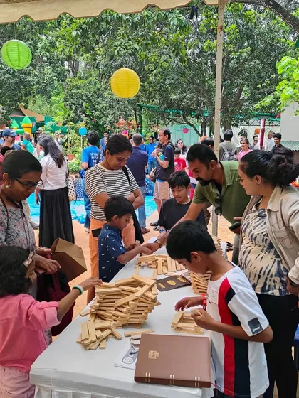 This is what our workshops are all about: a vibrant hub of activity where kids, parents, and friends gather to share ideas and build together. It's a hands-on, collaborative experience that brings the whole community together.