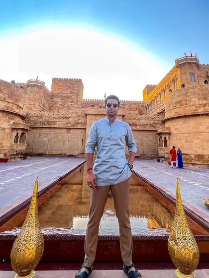 Standing in the magnificent Suryagarh palace in Jaisalmer. Being on tour for destination weddings allows me to explore these incredible places.