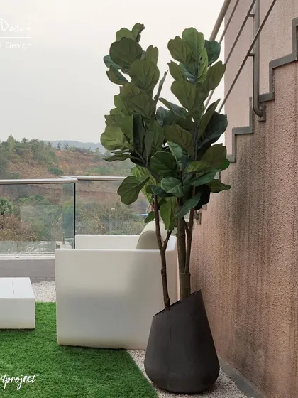 This bedroom in the Agra Fort Project is all about smart, functional design. An automated Murphy bed with an integrated couch keeps the space clutter-free, while a sliding partition conceals the bathroom door.