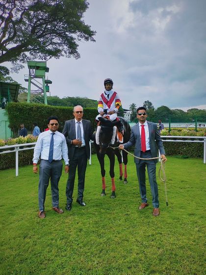 Victoria Doresaani, with jockey L. Alex Rozario, after winning The Ardent Knight Trophy.