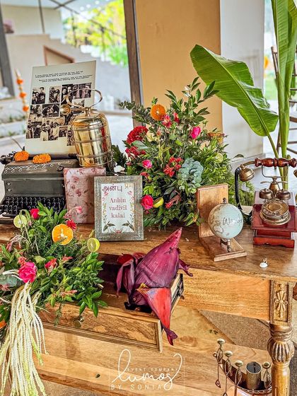A wider view of the story corner, filled with vintage items like a typewriter, telephone, and globe.