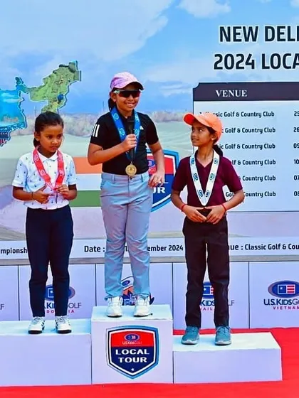 Aahana Shrivastava stands atop the podium, celebrating her 1st position at Event-3 of the US Kids New Delhi Fall Local Tour.