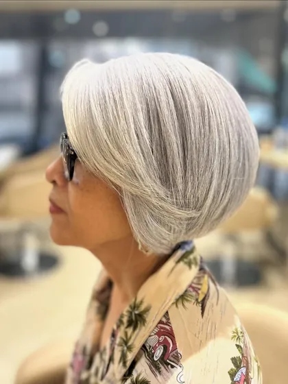 A classic bob is truly timeless. I crafted this precision haircut to create a chic, rounded shape that is both elegant and easy to manage for naturally beautiful silver hair.