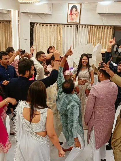 The entire group celebrating together on the dance floor.