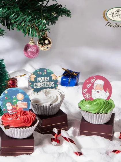 Our Christmas cupcakes are perfect for parties and gifting. Each one is topped with festive frosting and a cute holiday-themed topper.
