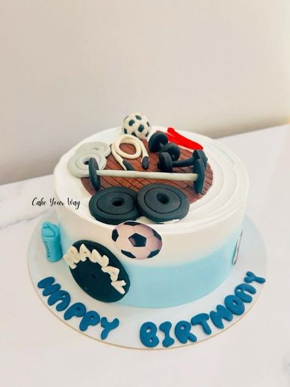 From barbells to soccer balls, this cake has got game. A perfect cake for a fitness and sports enthusiast.