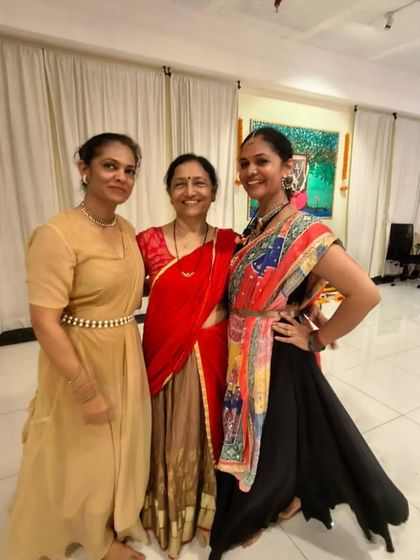 Dressed in our festive best for Navratri. These celebrations are a wonderful time to connect with family, friends, and our entire yoga community.