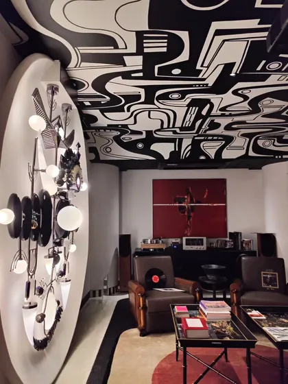 Our 'Sistine Chapel' ceiling mural, a black-and-white labyrinth of abstract forms that creates a dramatic and immersive experience in this residential entertainment room.