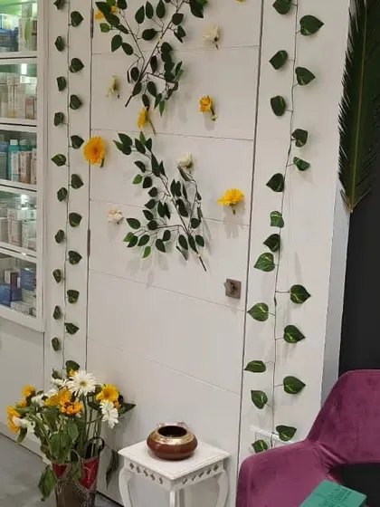 A wider view of our floral decoration work in a retail or clinic space. We ensure that even smaller decorative elements are placed thoughtfully to enhance the overall ambiance of the room.