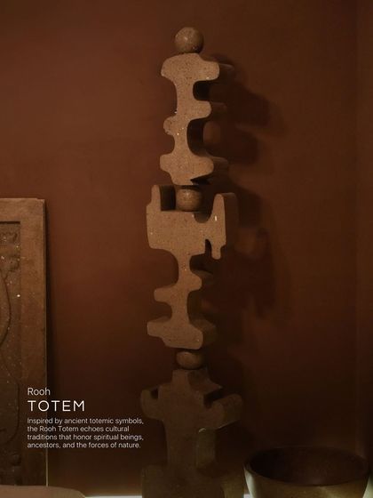 Inspired by ancient totemic symbols, the Rooh Totem echoes cultural traditions that honor spiritual beings, ancestors, and the forces of nature. It's a sculptural piece that stands as a powerful, grounding presence in any space.