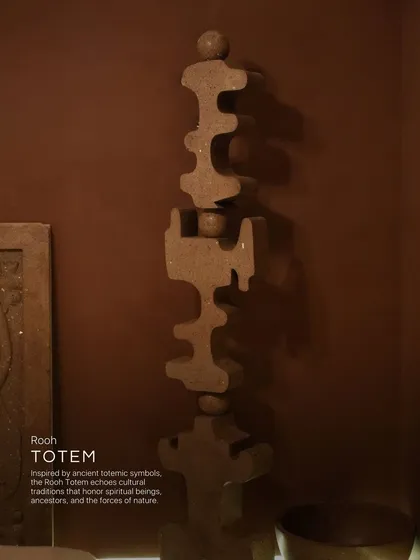 Inspired by ancient totemic symbols, the Rooh Totem echoes cultural traditions that honor spiritual beings, ancestors, and the forces of nature. It's a sculptural piece that stands as a powerful, grounding presence in any space.