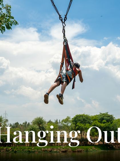Just "Hanging Out" over the lake on the Superman Swing. This ride gives you a unique, belly-down perspective as you soar through the air.