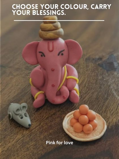 This lovely pink Ganesha represents love. Each one is unique, sculpted with care to be a perfect, heartfelt addition to your festive decor or as a housewarming gift.