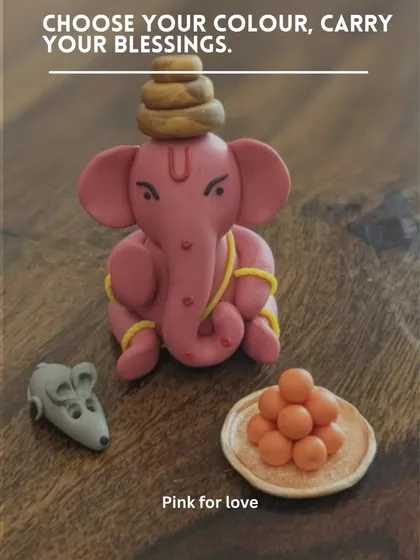 This lovely pink Ganesha represents love. Each one is unique, sculpted with care to be a perfect, heartfelt addition to your festive decor or as a housewarming gift.