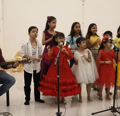From the classroom to the center stage. This is the moment it all comes together. Our young performers from the Gully Choir, dressed in their best, singing their hearts out with newfound confidence at one of our student showcases.
