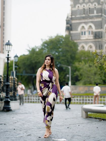 Another walking shot, this time with a side profile. It creates a sense of journey and movement.