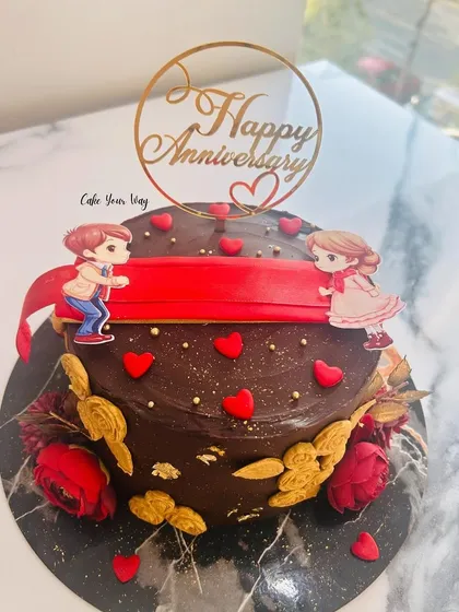 A rich chocolate version of the popular ribbon-pull anniversary cake.