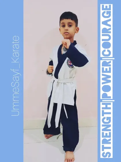 Don't let the cute face fool you. This young karateka has strength, power, and courage beyond his years. This is the confidence that karate builds.