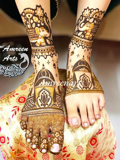 A close-up of the Marathi bridal feet, with detailed architectural domes and auspicious elephant figures.