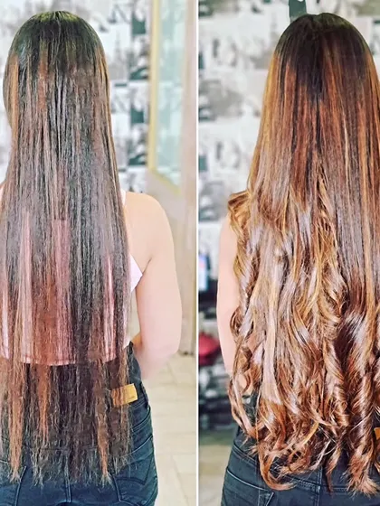 A stunning transformation from straight to curly. We used extensions to add significant length and then styled them into tight, beautiful curls for a completely new, voluminous look.