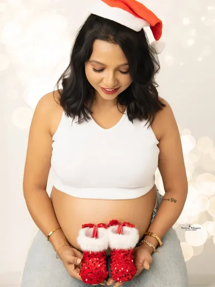 Celebrating the beautiful journey to motherhood with a festive maternity portrait. I also offer maternity sessions to capture your glow before your little one arrives.