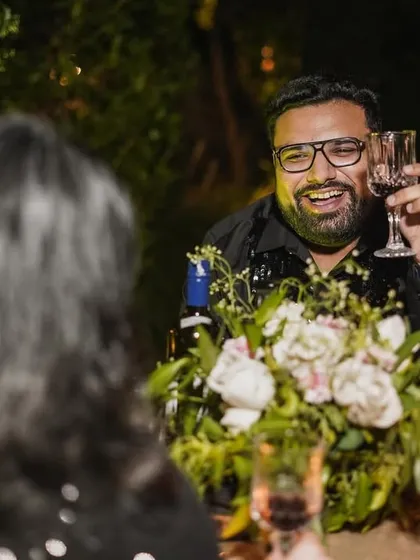 Capturing his joyful laughter during their celebratory dinner. These candid shots of each partner add depth and personality to the final photo collection.