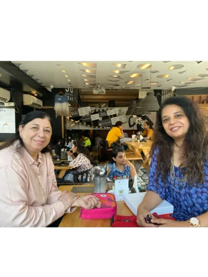 So much of my journey is about the people I share it with. This is a candid moment with my mother, who has been a constant source of support. Balancing the many hats I wear as a mother, leader, and designer has been an adventure, and her belief in me has been my anchor.