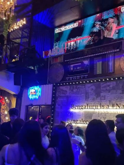 The VJ screen showing my visuals while the crowd parties below. A complete audio-visual takeover.