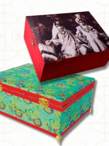 I love offering variety in my designs. Here you can see two distinct styles of trousseau boxes, one with a vintage portrait and another with a vibrant, modern floral print, showing there's a style for every bride.