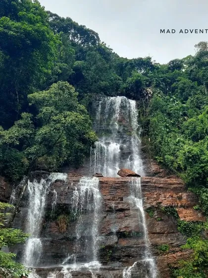 The multi-tiered Jhari Falls in Chikmagalur, a perfect spot to relax and enjoy the beauty of the Western Ghats.