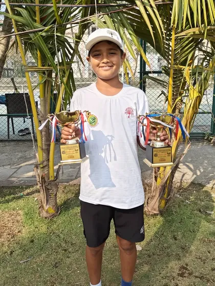 Two trophies are always better than one. Aarav Chhallani after his successful campaign at the U-12 National Tournament held at MSLTA, Mumbai.
