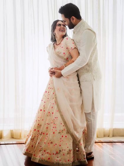 A beautiful portrait of the happy couple on their engagement day. The bride's soft, radiant makeup looks flawless and full of light.