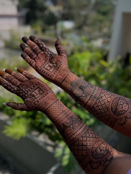 Another perspective of the engagement mehendi, highlighting the intricate details and the balance between the two hands.