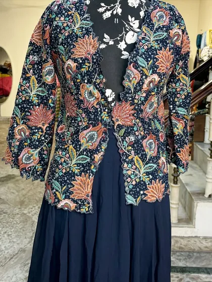 A closer look at our most selling Indo-Western outfit. The intricate floral embroidery is all done by hand.