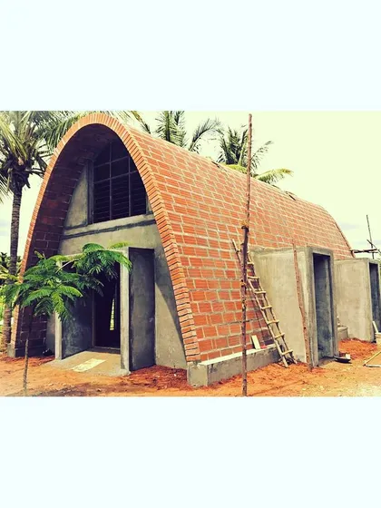 The form of this farmhouse is inspired by the simple, powerful geometry of a brick vault. Currently under construction, this project uses locally sourced bricks to create a unique, climate-friendly structure that feels both ancient and modern.