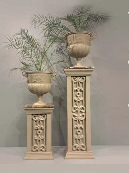 For a more classical look, we offer colonial-style planters on ornate pedestals.