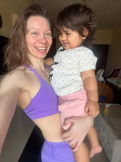 A simple, unposed moment of joy with my daughter, Emi. Motherhood is not always a serene journey, but moments like this make every effort worthwhile. This is real life, away from the yoga mat.