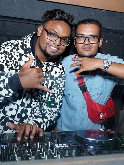 Another shot from behind the decks with a collaborator. Teamwork makes for an unforgettable night.