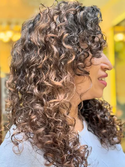 A collection of my other no-bleach balayage and color work, showcasing a variety of tones from subtle browns to vibrant reds on different curl types.