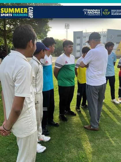 A candid moment of mentorship with Sh. Sarkar Talwar and young cricketers at the summer camp.