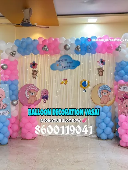 A classic "It's a Boy, It's a Girl" theme using pink and blue balloon pillars and cute baby cutouts. The stork and moon elements add a whimsical touch to this popular baby shower design.