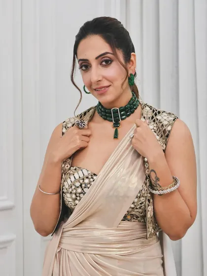 The complete look from the Nykaa shoot. The ponytail adds a touch of modern sophistication to the fusion saree look.