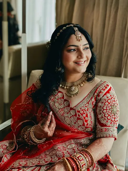 A close-up portrait of Shikha. You can see the details of her soft glam makeup, from the perfectly blended eyeshadow to the flawless skin.